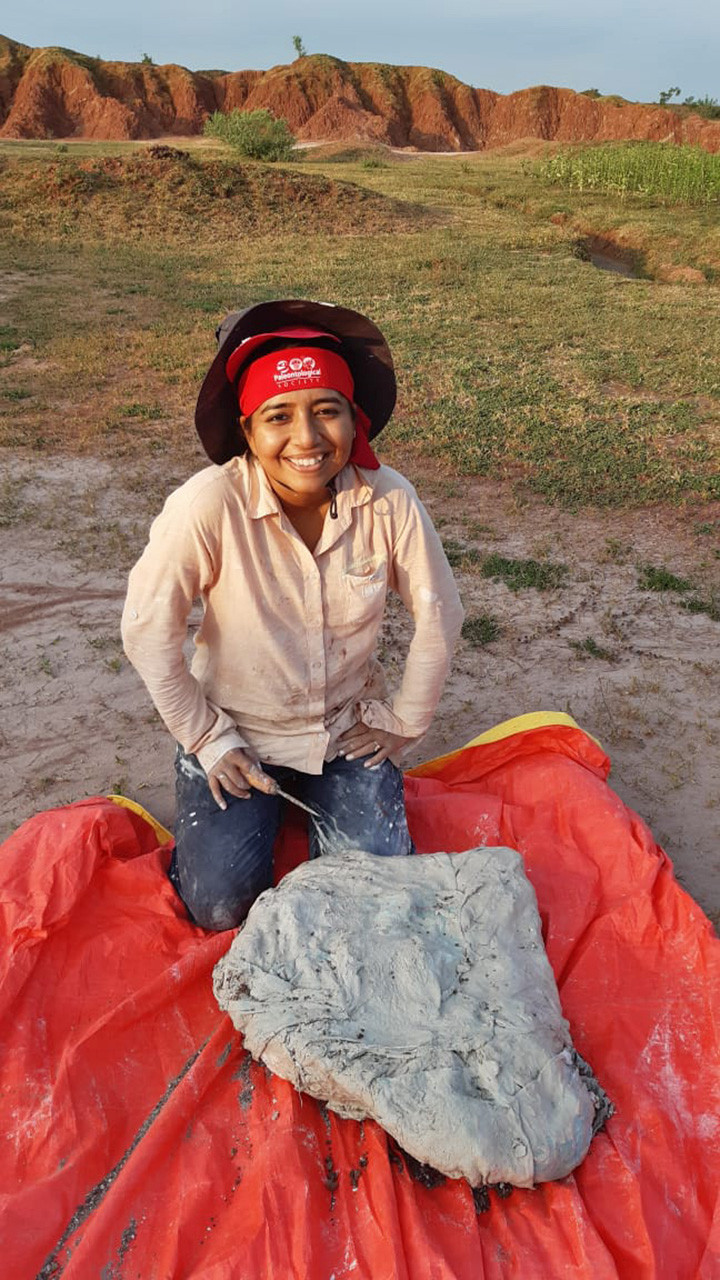 Hard earned smile with plastered fossil - Dinosaur Lady | Nature inFocus
