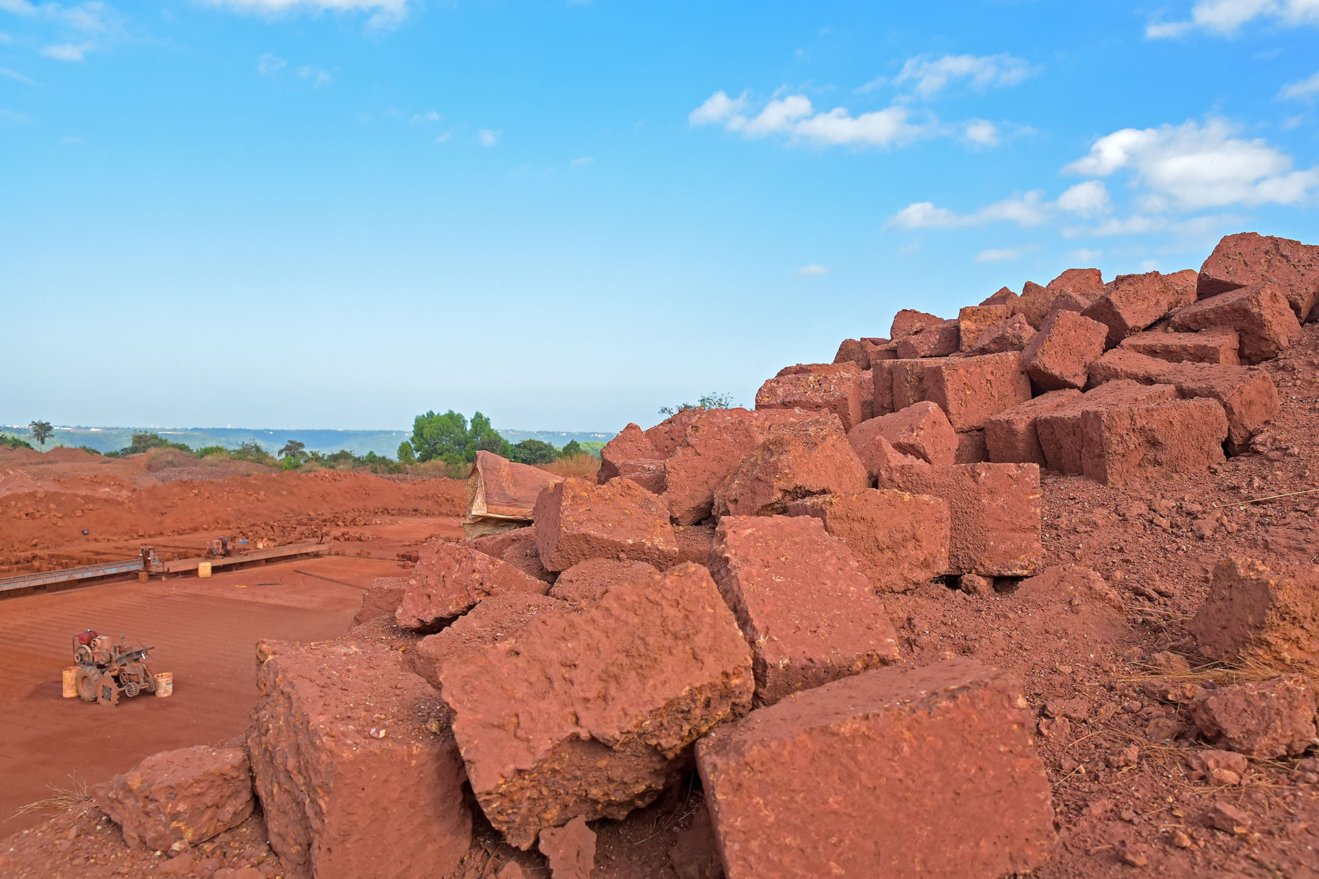 Laterite red stone bricks near a laterite quarry