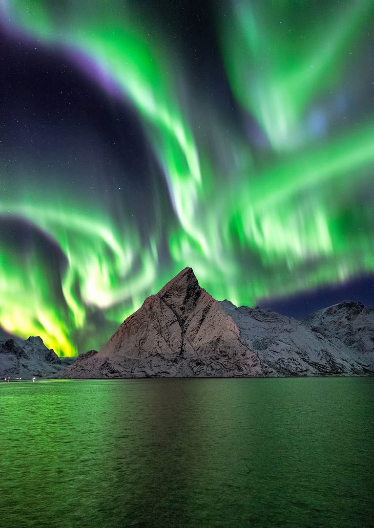 Northern Lights in Reine in Lofoten Islands at Norway